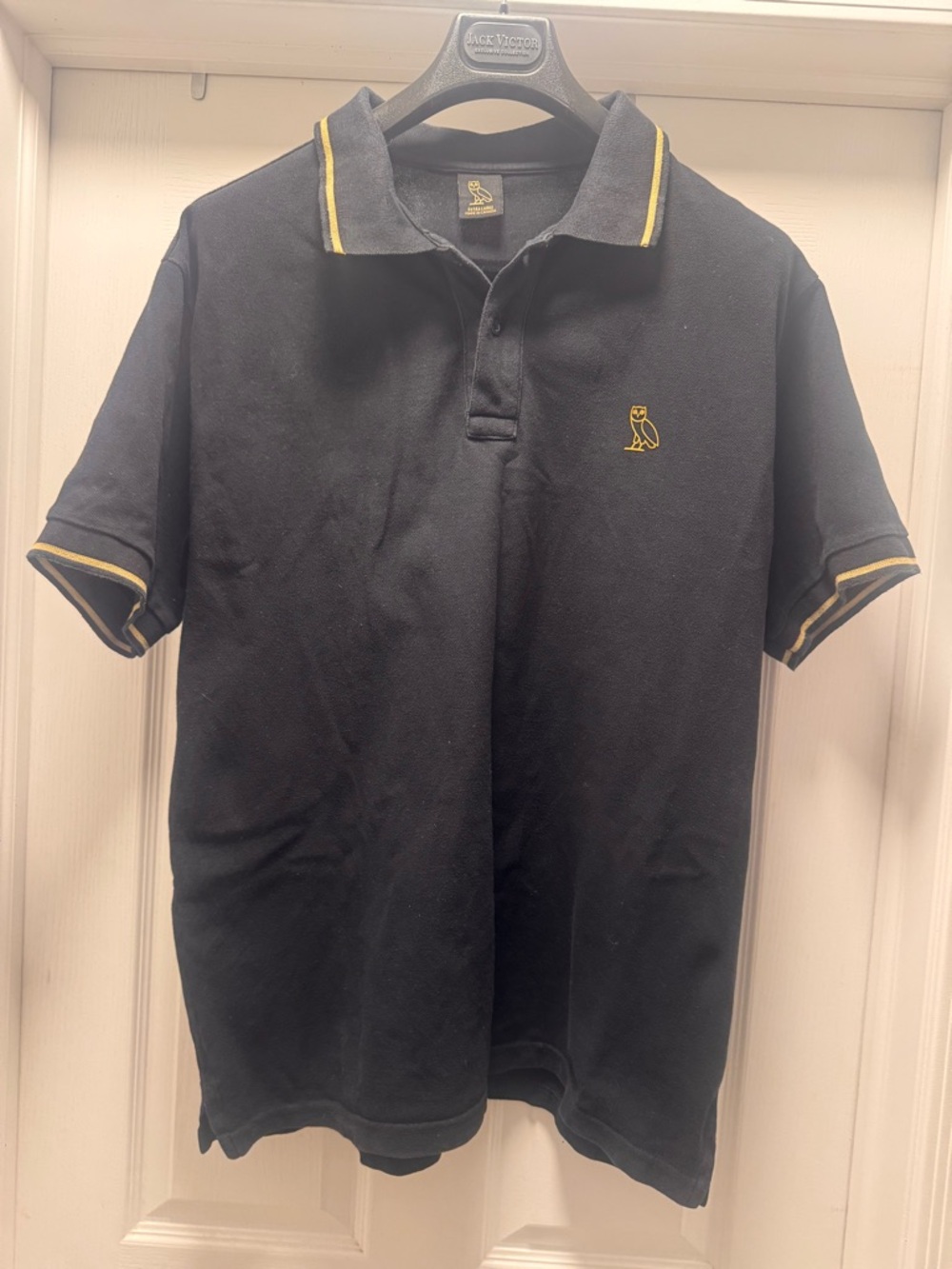 Black Polo Shirt with Yellow Trim and Embroidered Owl